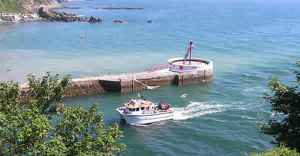 The sandy beach and fishing village of Looe is close by